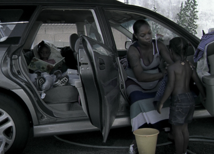 Mom and children experiencing homelessness and living out of their car